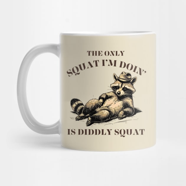 The Only Squat I’m Doin’ Is Diddly Squat - Funny Cowboy Raccoon by Creatifly Graphic Tees